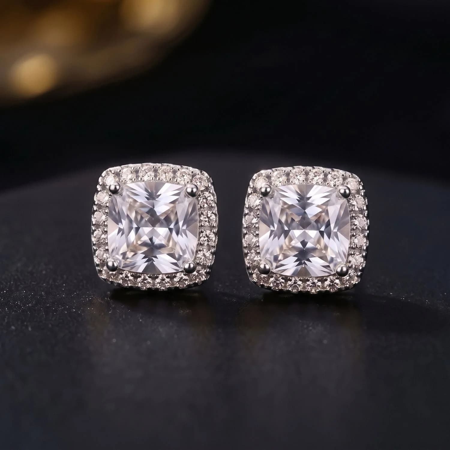 Men's cushion cut pavé halo stud earrings with CZ in polished stainless steel, another angle
